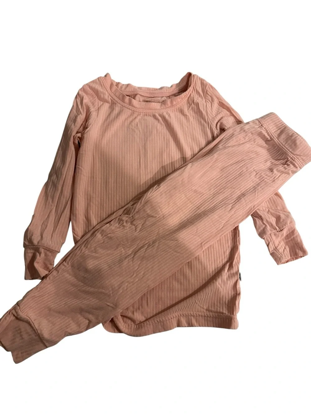This Little Sleepies pajama set is made from pink ribbed bamboo fabric.
